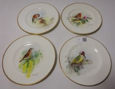 Set of four Royal Worcester plates hand-painted and signed by W.