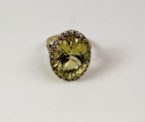 Large oval lemon quartz and diamond cluster ring with diamond shoulders tested to 18ct (quartz