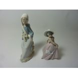 Two Lladro figurines - Seated lady with lilies, H 24cm and 'Iris' No.