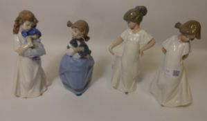 Four Nao figurines, two girls in white dresses,