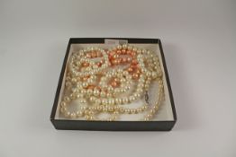 Three freshwater pearl necklaces and bracelet and a necklace with pearl set silver clasp