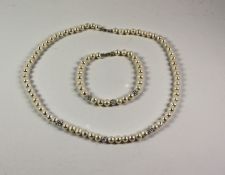 Freshwater pearl and diamante necklace and matching bracelet the clasps stamped 925