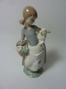 Lladro figure of a lady with flower basket holding a lamb H 25cm Condition Report