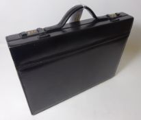 Clothing and Accessories - Black leather suitcase Condition Report <a