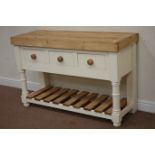 Rustic waxed pine dresser fitted with three drawers raised on painted potboard base, W131cm, H85cm,