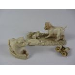 Late 19th century/early 20th century carved ivory group of dog and frog,