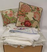 Embroidered lace-edge linen, an embroidered cushion and similar,