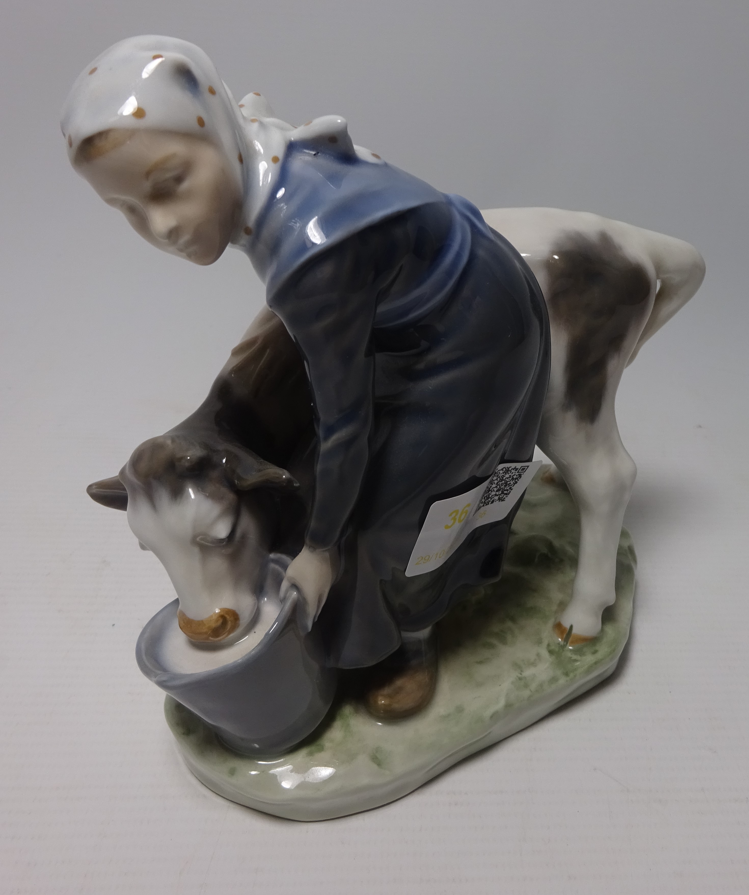 Royal Copenhagen figure of a milk maid with a calf, No.