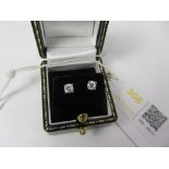 Pair of round brilliant cut diamond stud ear-rings stamped 750 approx 0.