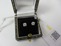 Pair of round brilliant cut diamond stud ear-rings stamped 750 approx 0.