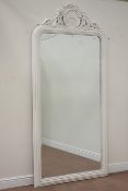 Large white finish wood framed bevelled mirror, rounded top with carved shell pediment,