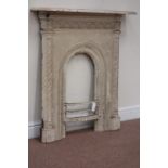 Late 19th century cast iron fireplace arch aperture with moulded frieze and upright decoration,