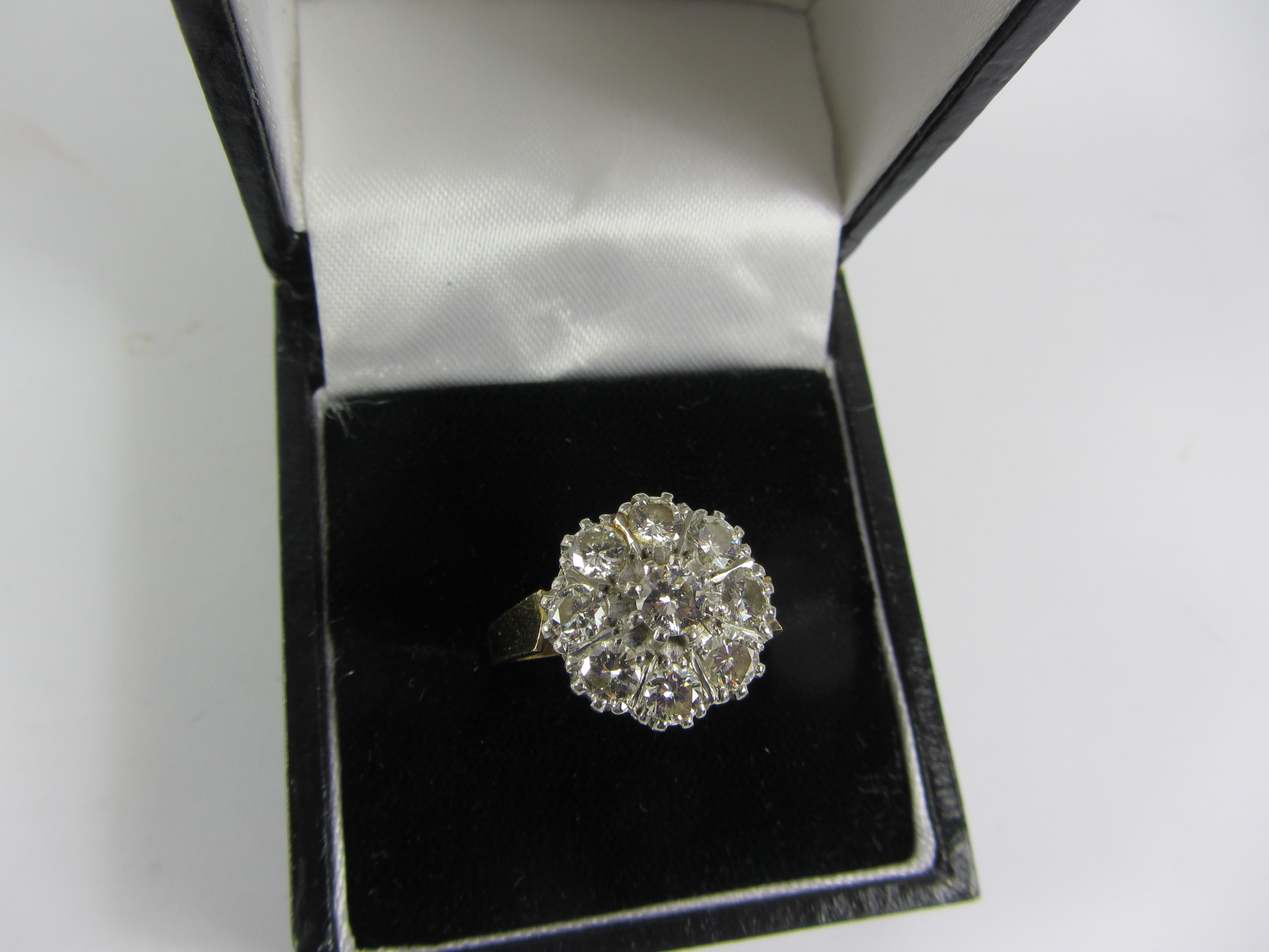 Nine stone diamond cluster ring stamped 18k diamonds approx 2 carats Condition Report