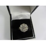 Nine stone diamond cluster ring stamped 18k diamonds approx 2 carats Condition Report