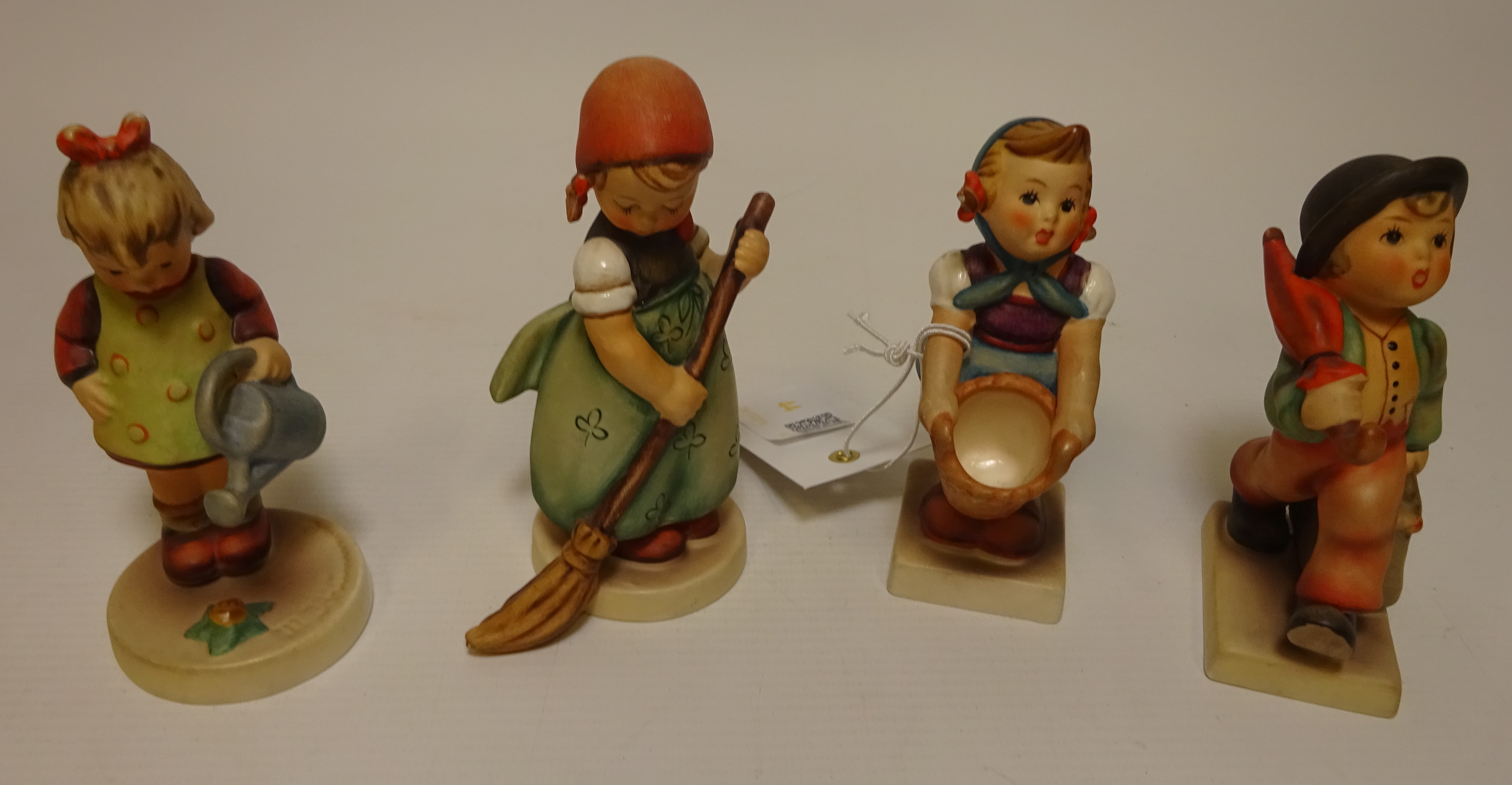 Four Goebel Hummel figures Condition Report <a href='//www.davidduggleby.