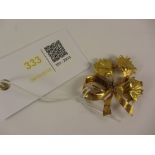 Gold sapphire set leaf spray brooch stamped 750 609AL London import marks I U Ld approx 10.