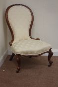 Victorian spoon back nursing chair, serpentine seat, raised on carved cabriole front legs,
