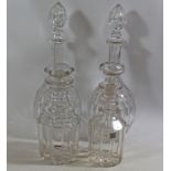 A pair of Edwardian cut glass decanters and two 19th century cut glass decanters