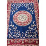 Persian Keshan design blue ground rug,