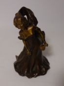 Bronze handbell modelled as an Art Nouveau lady holding a bell signed, B. Girardet, H14.