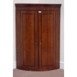 Early 19th century oak and mahogany banded bow front wall hanging corner cabinet, W77cm,