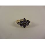 Blue tourmaline flower set gold ring hallmarked 9ct Condition Report <a