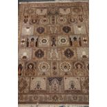 Keshan Super carpet, decorated with assorted panels and floral borders,
