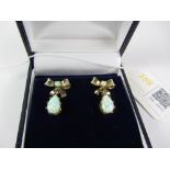 Pair of opal bow silver-gilt drop ear-rings stamped 925 Condition Report <a