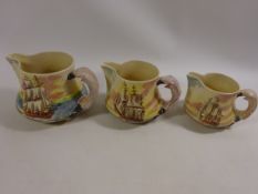 Set of three Royal Doulton graduating jugs from the 'Famous Ships' series.