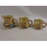 Set of three Royal Doulton graduating jugs from the 'Famous Ships' series.