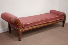 Mid 19th century oak upholstered scroll chaise longue, raised on octagonal tapering feet,