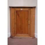 19th century polished pine corner cabinet enclosed by single panelled door, W76cm,