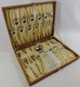 Gottinghen stainless steel and 24ct fine gold cased dessert service Condition Report