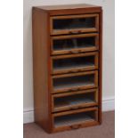 Early 20th century oak haberdashery shops chest fitted with six glazed doors, W46cm, H93cm,