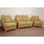 Cintique light oak framed two seat sofa (L140cm) and pair of matching armchairs (W90cm) upholstered