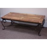 Rectangular hardwood coffee table raised on wrought iron base, 135cm x 71cm,