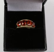 Four stone garnet ring hallmarked 9ct Condition Report <a href='//www.