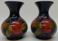 Pair of Walter Moorcroft Pomegranate vases, potter to H.