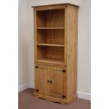Stained pine open bookcase with double cupboard below, W81cm, H182cm,