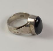Silver ring set with a large polished blue stone stamped 925 Condition Report