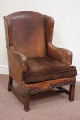 Early 20th century leather wingback armchair,