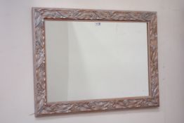 Silver and copper finished foliage framed mirror,
