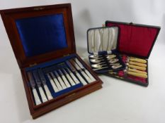 Edwardian mahogany cased twelve place mother of pearl desert knives and forks,