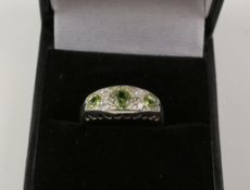 Peridot dress ring stamped sil Condition Report <a href='//www.davidduggleby.
