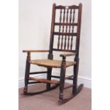 19th century country elm and beech rocking armchair with rush seat Condition Report