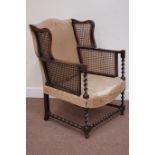 Early 20th century beech framed bergere wingback armchair,
