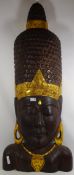 Large carved hardwood Buddha with gilded detail,