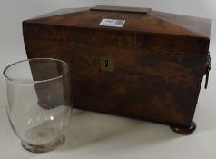 19th Century figured mahogany sarcophagus shaped tea caddy with loose glass liner and a model