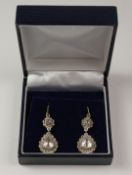Pair of Belle Epoque old cut diamond pendant ear-rings, pear shaped diamonds approx 1.