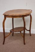 Early 20th century walnut shaped top centre table with undertier, 74cm x 50cm,